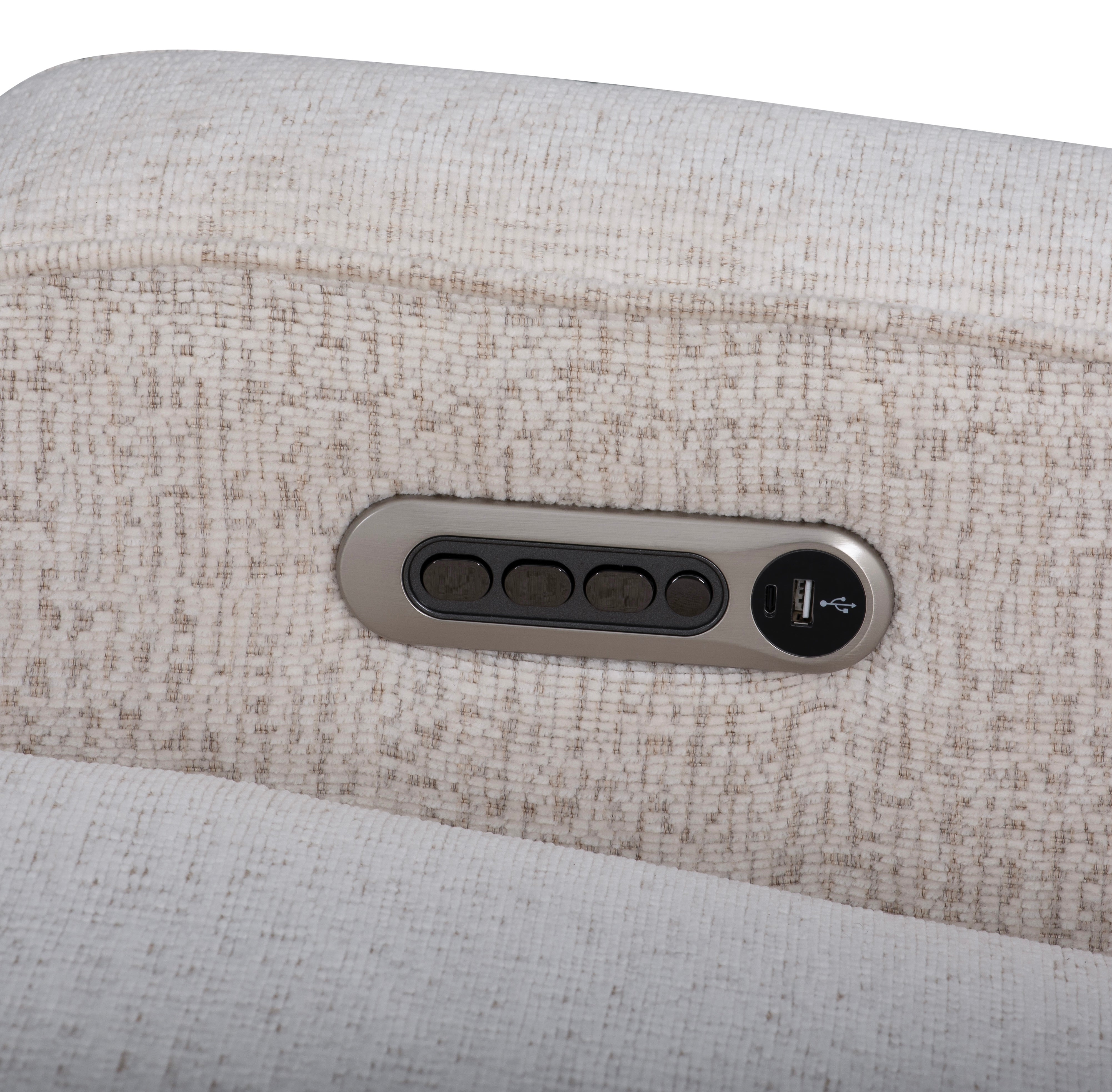 Close-up of a textured fabric surface with a USB charging port and power button.