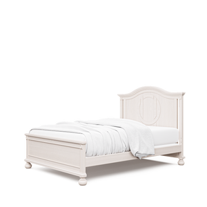 Dakota crib converted to full bed (shown with optional low profile footboard), in washed white