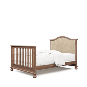 Dakota crib with beige velvet tufted headboard, converted to full bed, in nocello