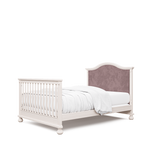 Load image into Gallery viewer, Dakota crib with pink velvet tufted headboard, converted to full bed, in washed white
