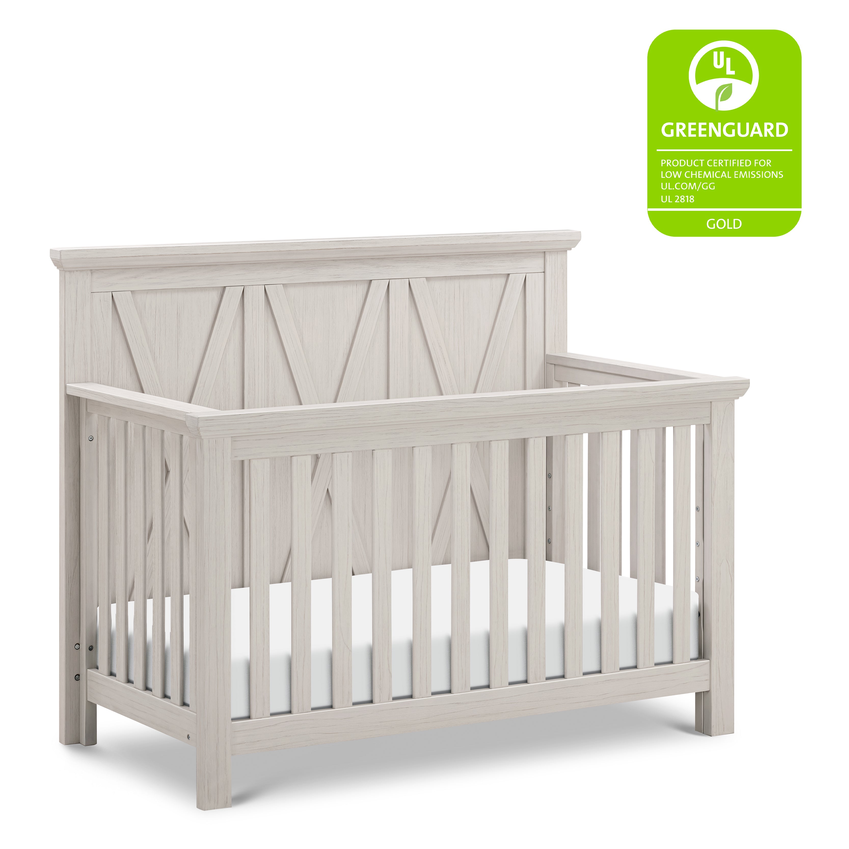 White driftwood Emory crib with Greenguard Gold certification label on a white background