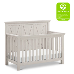 White driftwood Emory crib with Greenguard Gold certification label on a white background