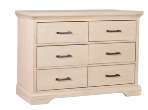 Beige dresser with four drawers and metal handles on a white background