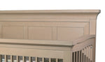 Load image into Gallery viewer, Wooden crib with a detailed headboard
