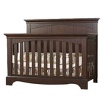 Load image into Gallery viewer, Wooden crib with mattress on a white background
