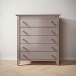 Load image into Gallery viewer, Gray dresser with five drawers on a wooden floor against a white wall
