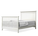Load image into Gallery viewer, White crib converted to full bed set on a white background
