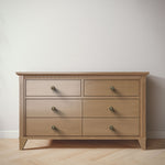 Load image into Gallery viewer, Wooden dresser with six drawers on a plain background
