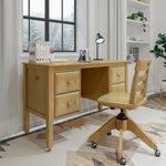Load image into Gallery viewer, A light natural wood writing desk with three drawers and a matching swivel chair, styled in a bright home office setting with a window, books, and plants.
