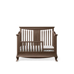 Load image into Gallery viewer, Wooden crib, converted to toddler bed, with slatted design on a white background
