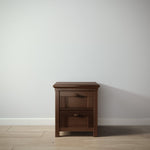 Load image into Gallery viewer, Wooden nightstand with two drawers against a white wall.
