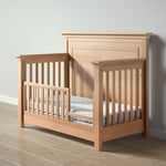Load image into Gallery viewer, Karisma crib in natural wood, converted to a toddler bed
