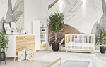 Load image into Gallery viewer, Modern nursery with wooden crib, dresser, and bookshelf against a decorative wall.
