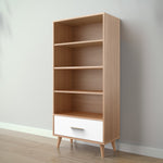 Load image into Gallery viewer, Wooden bookshelf with a white drawer against a plain wall.
