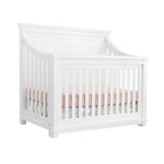 Load image into Gallery viewer, White crib with pink mattress on a white background

