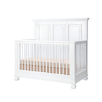 Load image into Gallery viewer, White crib with a  mattress on a white background
