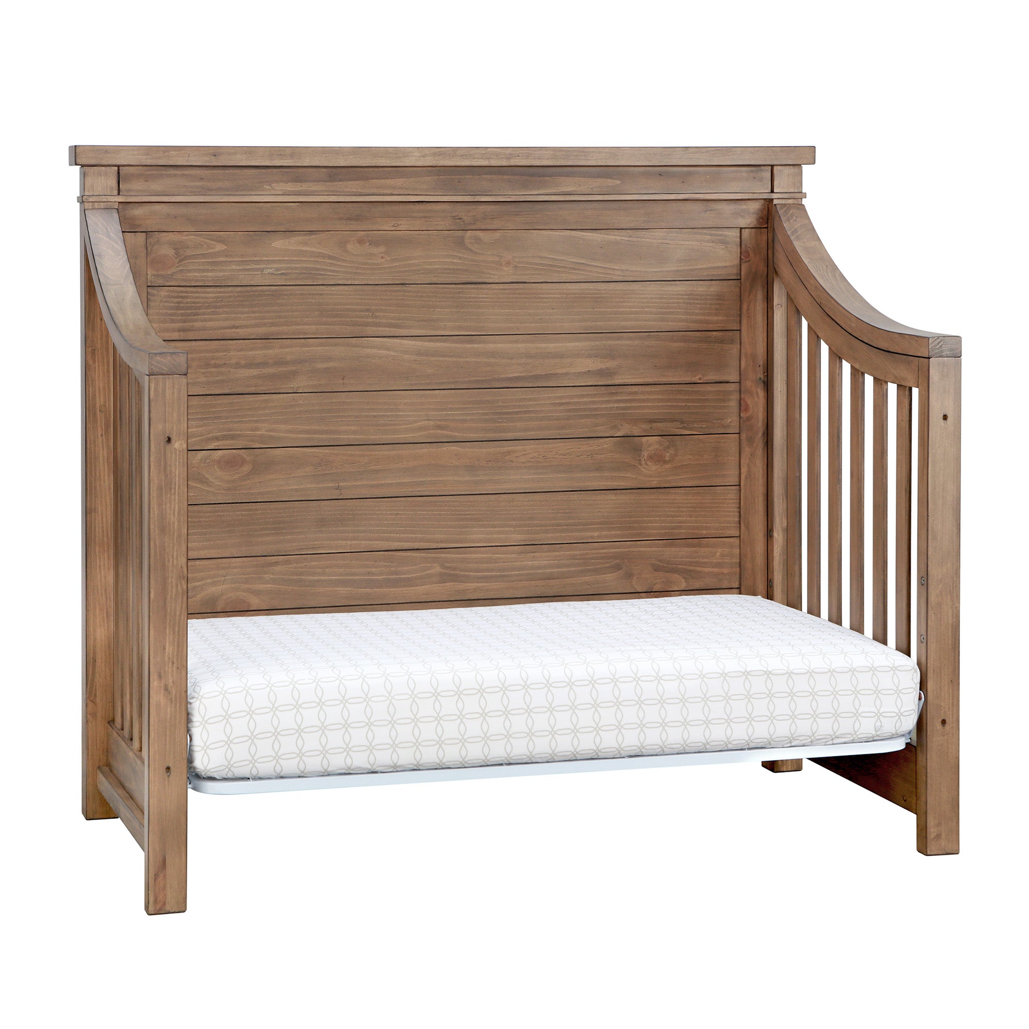Rowan crib shown converted to daybed