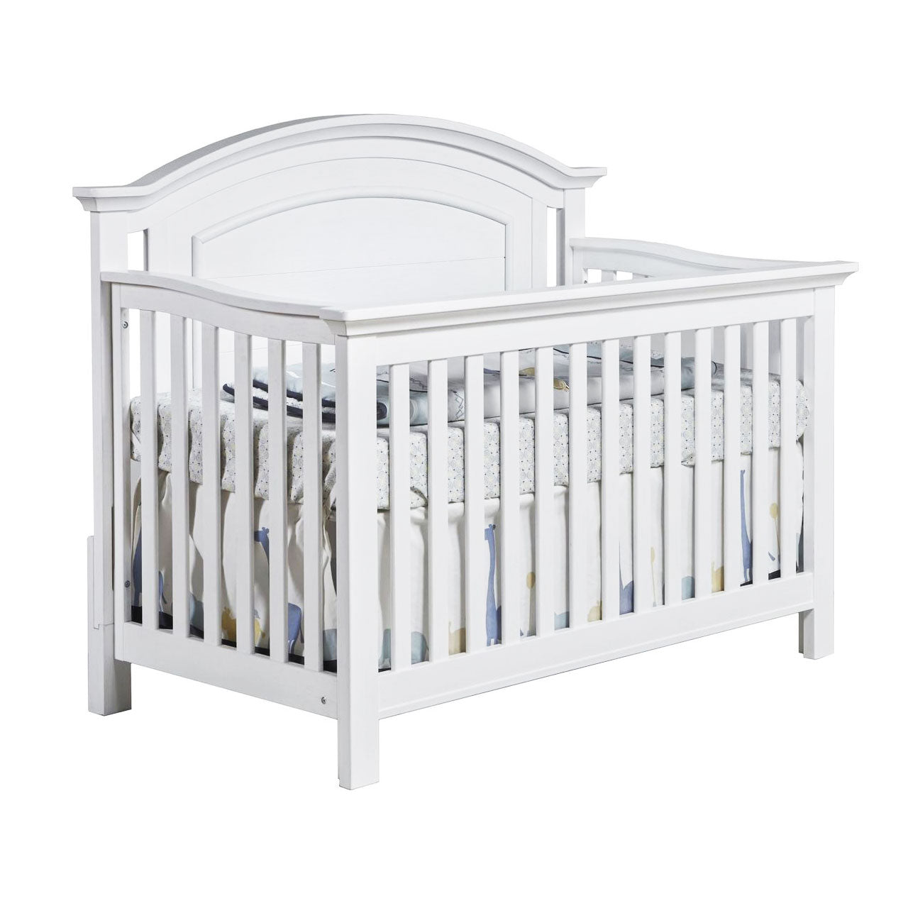 Como curved top crib shown in vintage white