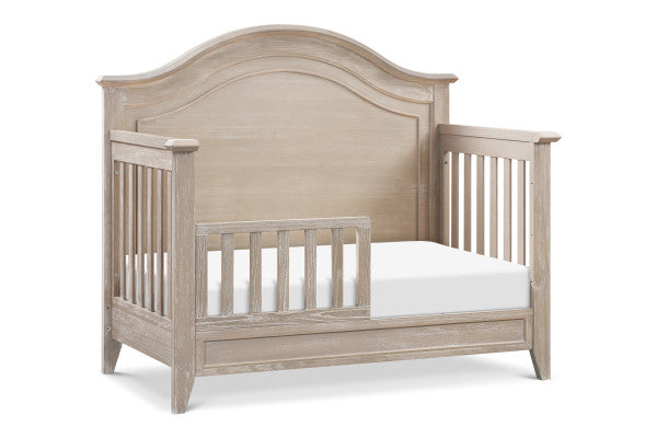 Beckett Rustic curved top crib, converted to toddler bed, in sandbar 