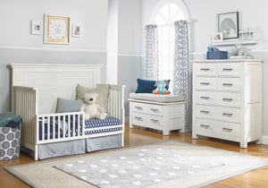 Lucca collection (flat top crib converted to toddler bed & chest), shown in seashell white