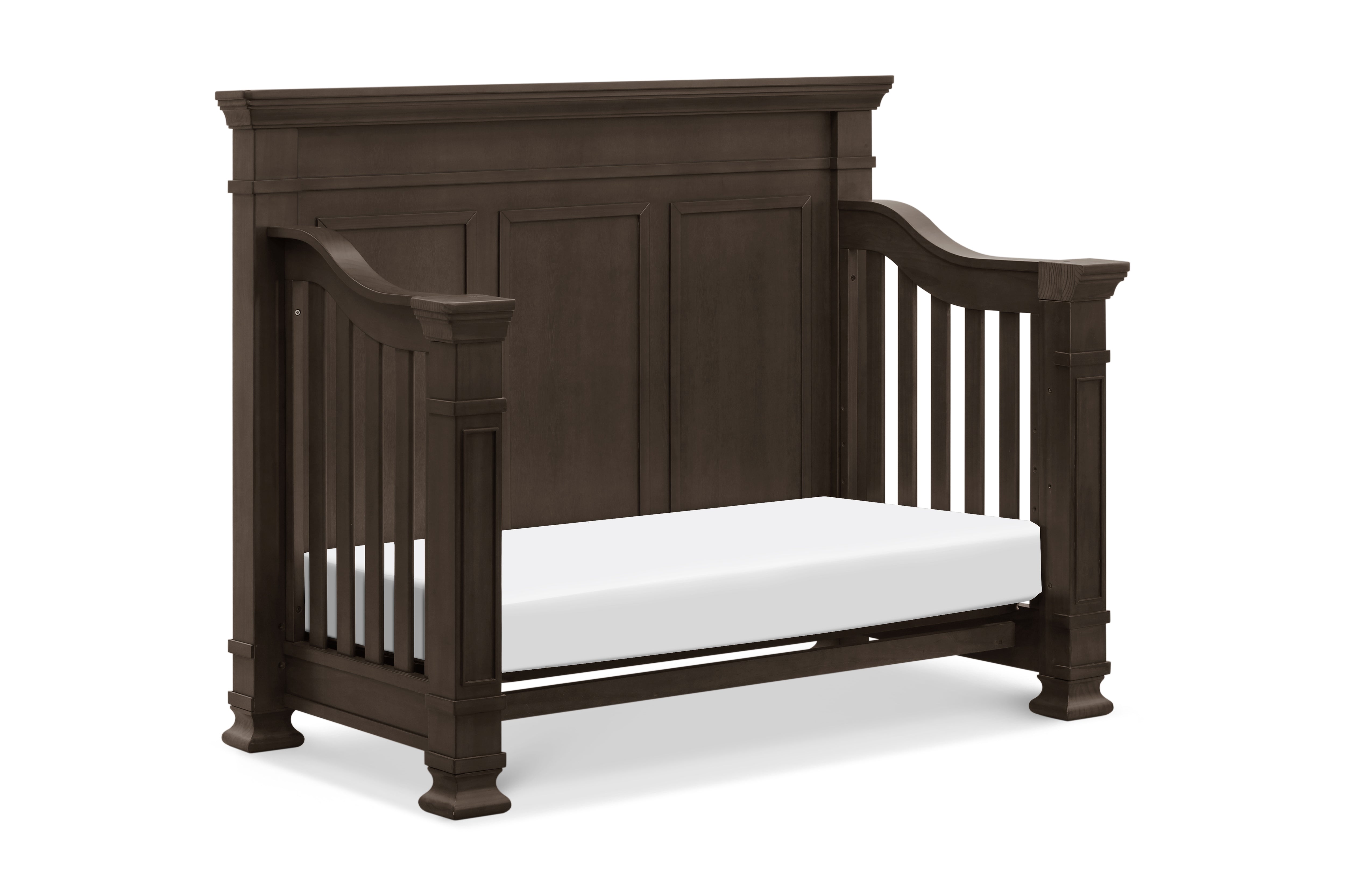 Tillen crib converted to daybed, shown in truffle 