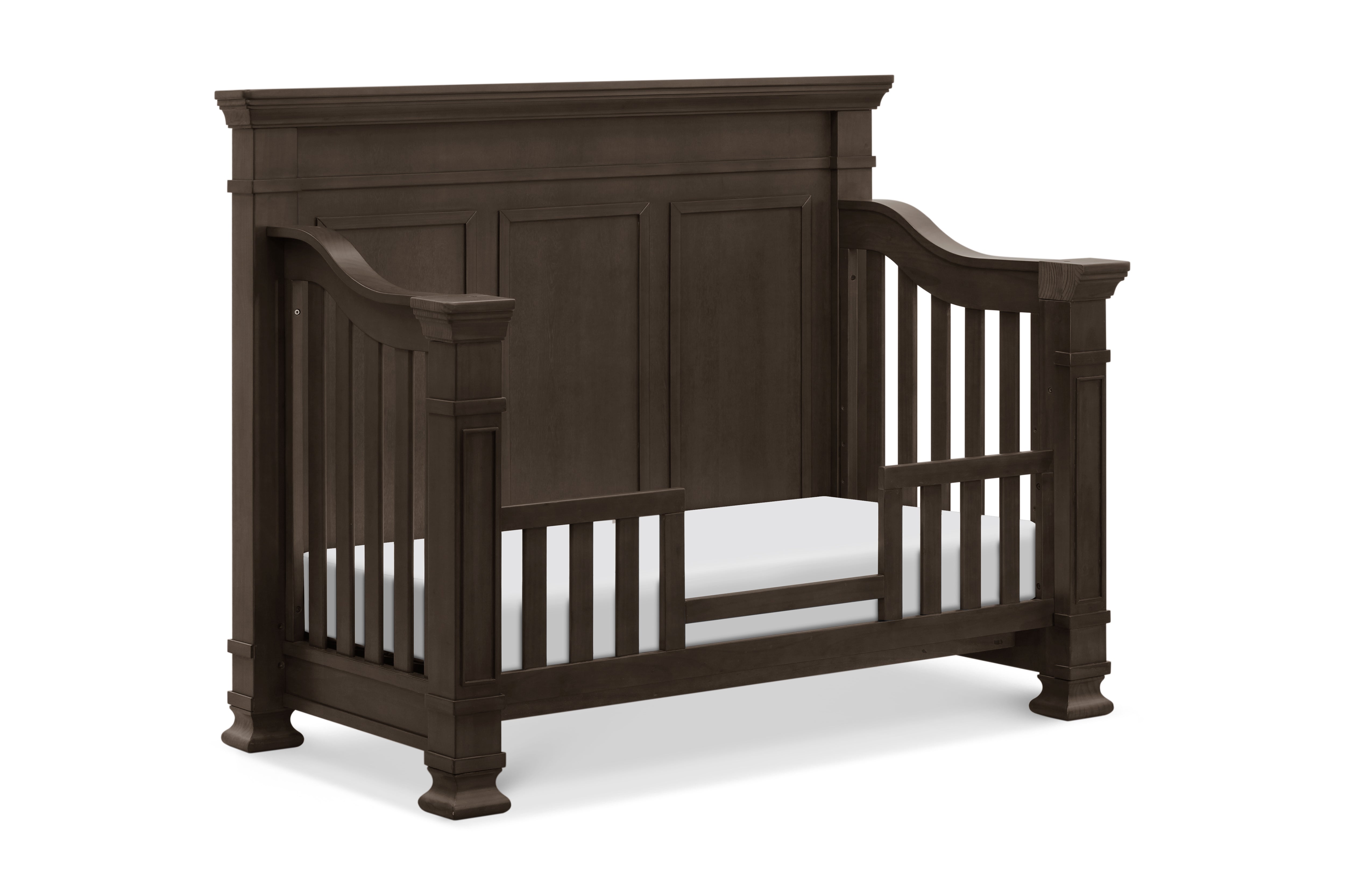 Tillen crib converted to toddler bed, shown in truffle