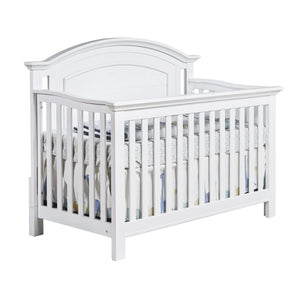 Como curved top crib in vintage white
