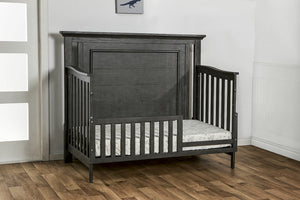 Como flat top crib converted to toddler bed, shown in distressed granite
